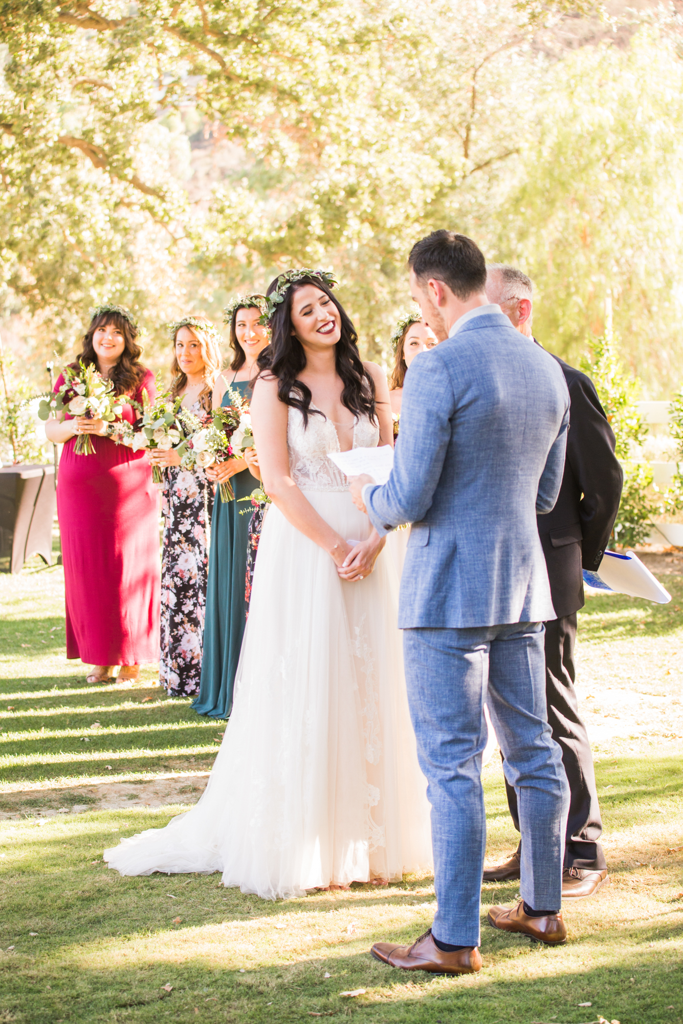 Brides reaction to groom's vows during fall wedding 