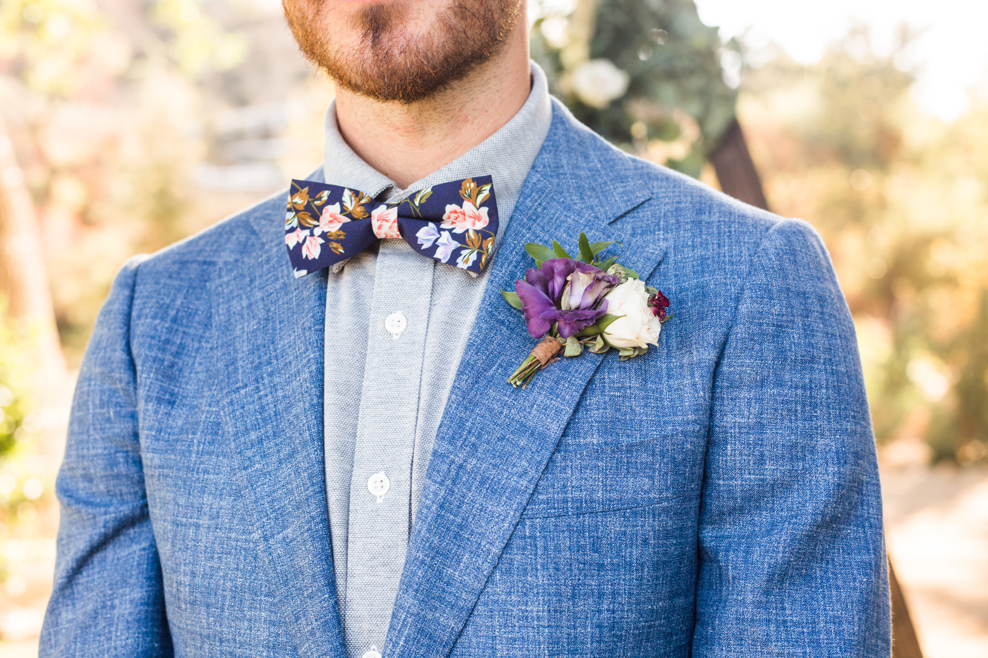 Grooms fall colored rustic boutonniere