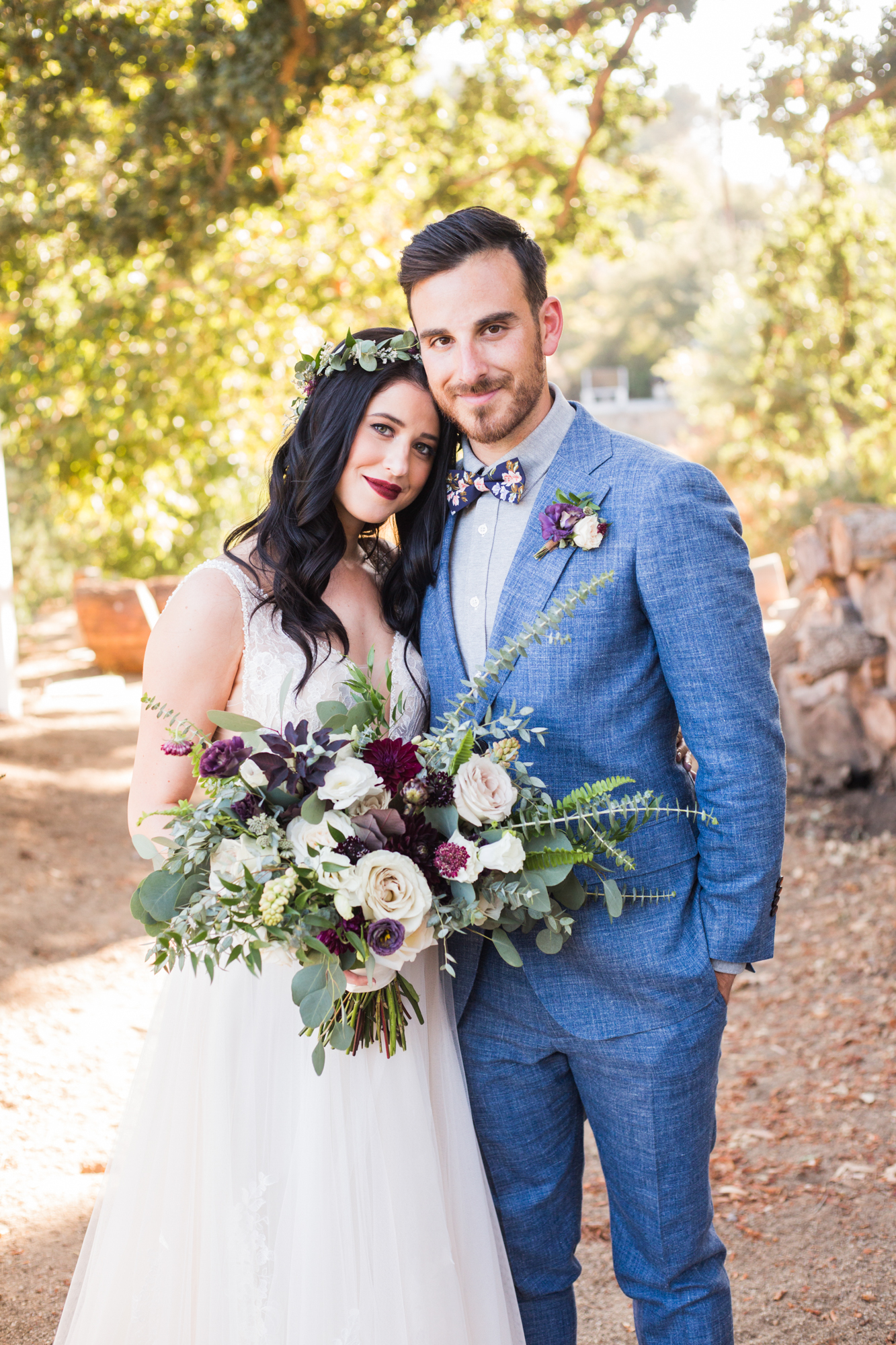 Rustic and Moody bride and groom with dark florals