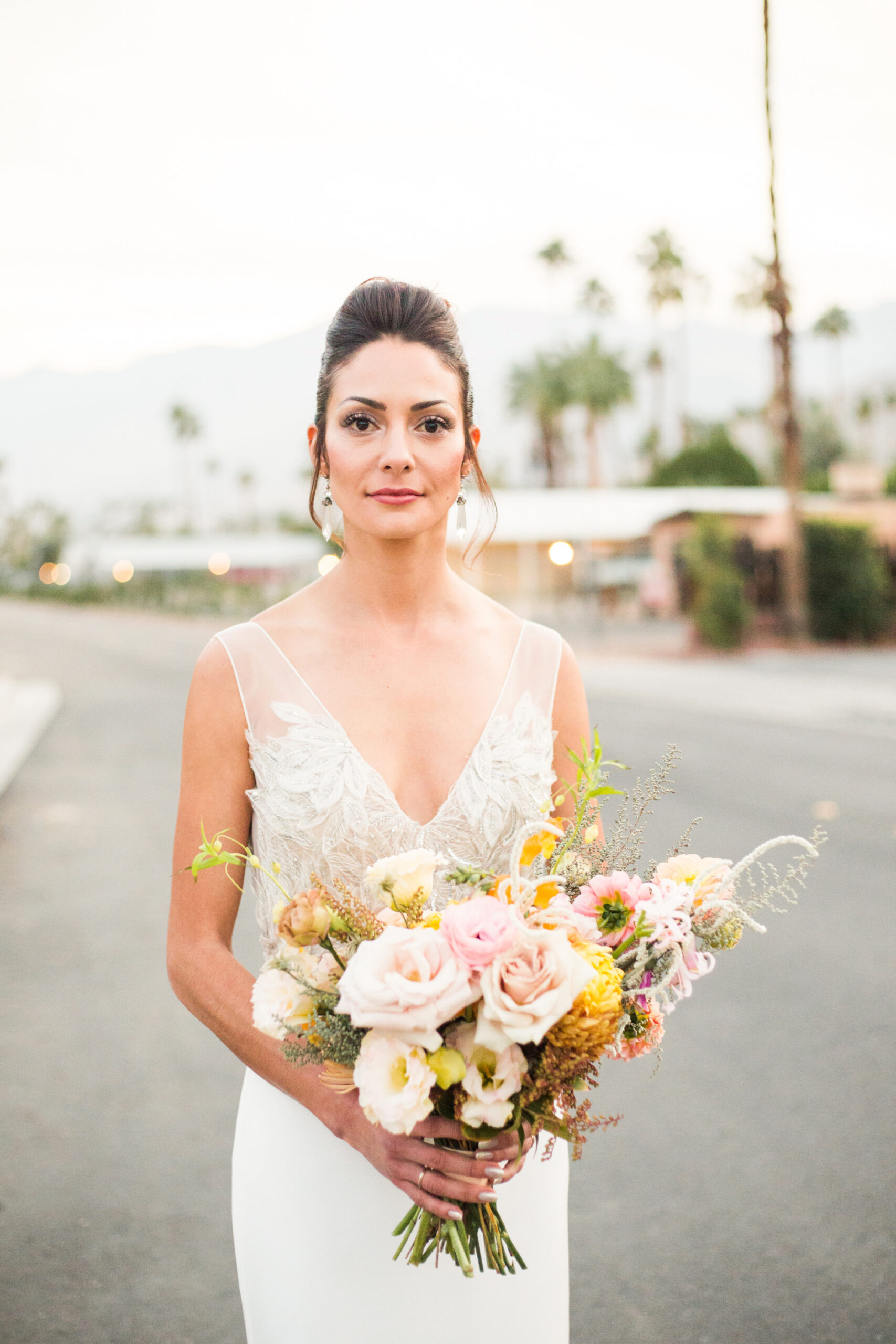 Beautiful bride with colorful desert inspired boquet
