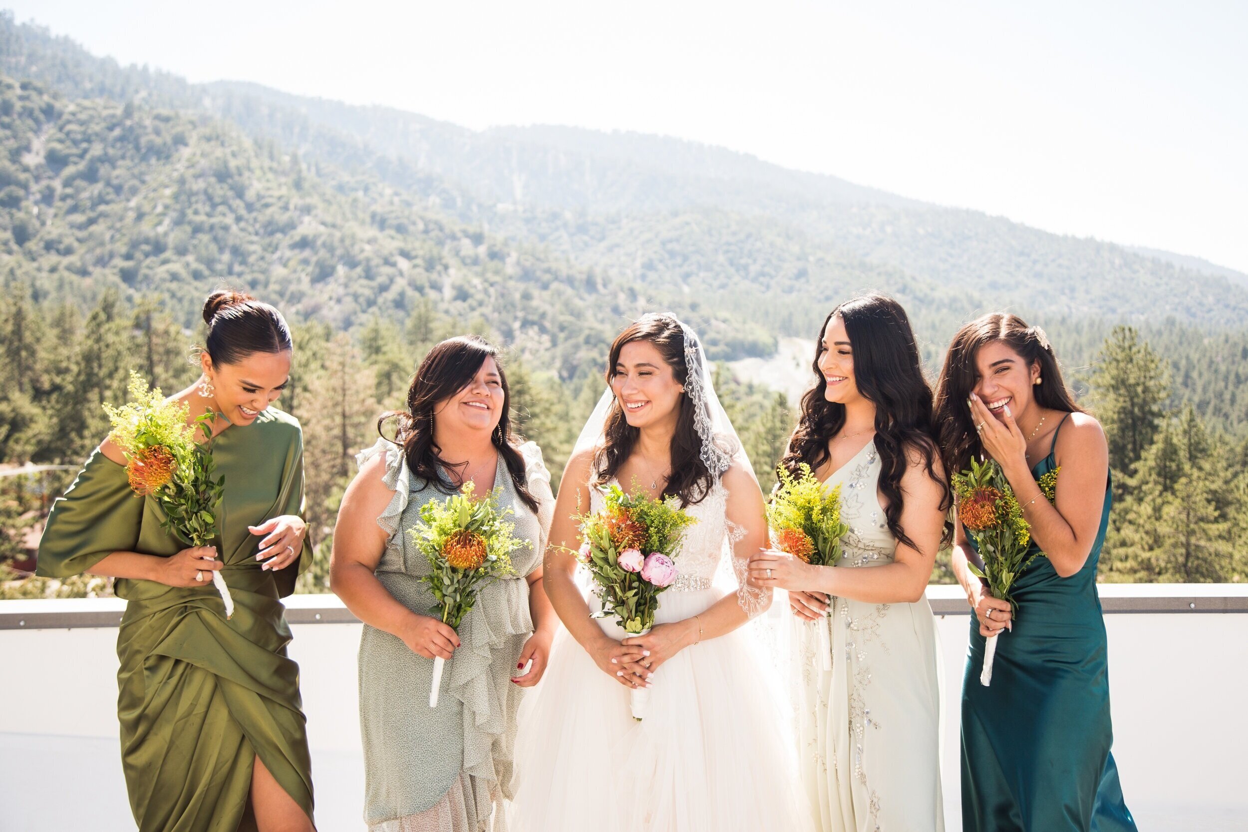 Green mismatched bridesmaids dresses